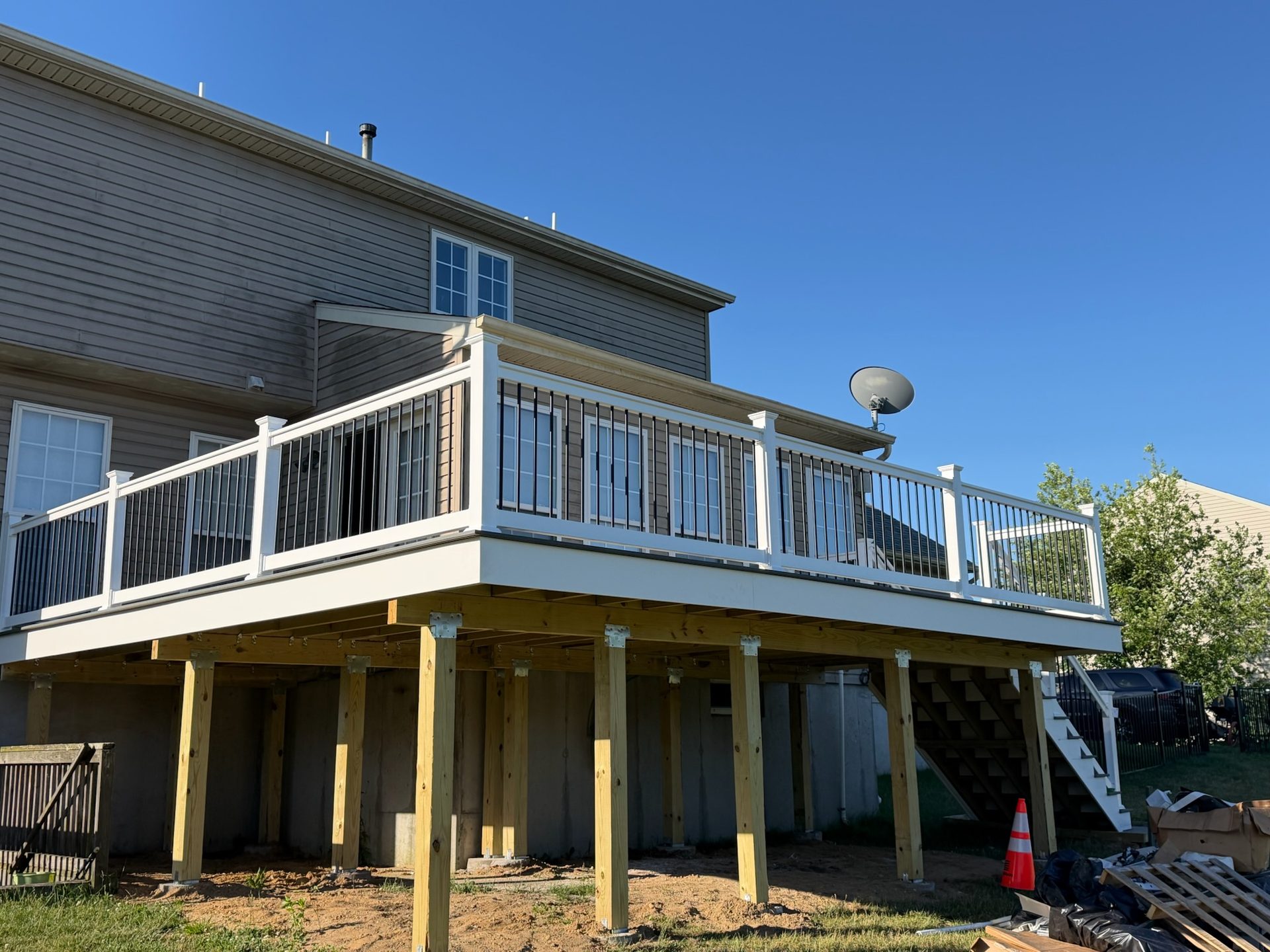 Deck footings and support posts set before decking